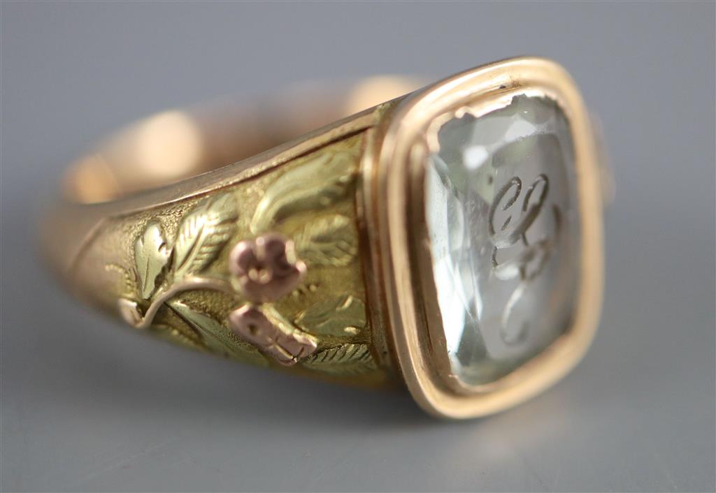 A William IV two colour gold and JA monogrammed aquamarine set ring,